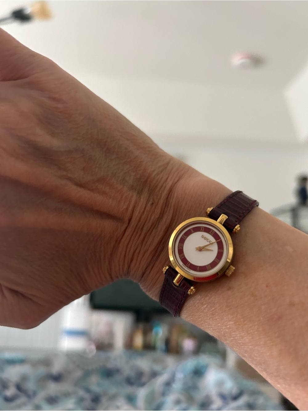 Gucci Women's Gold Case Watch with Burgundy Strap and Dial Accents